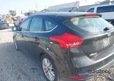 2015 Ford Focus Titanium from USA, damaged, VIN 1FADP3N24FL214270